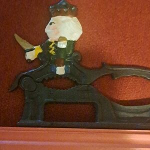 Vintage Nutcracker Soldier on red wood base